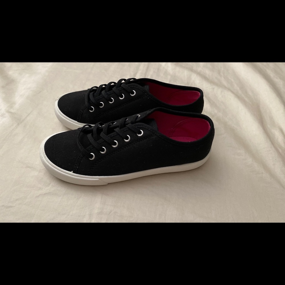 Never worn. Brand new with no tag. Black slip in sneakers.